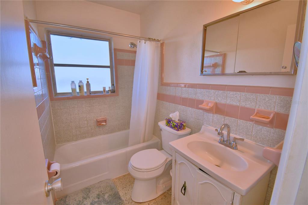105 Maxcy Lane Frostproof, FL 33843 - Photo 18 of 49 a bathroom with a sink toilet and shower