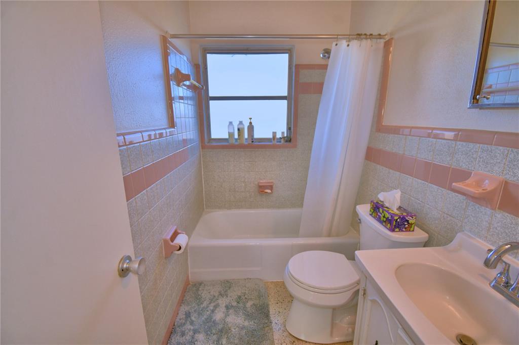 105 Maxcy Lane Frostproof, FL 33843 - Photo 19 of 49 a bathroom with a sink toilet and shower