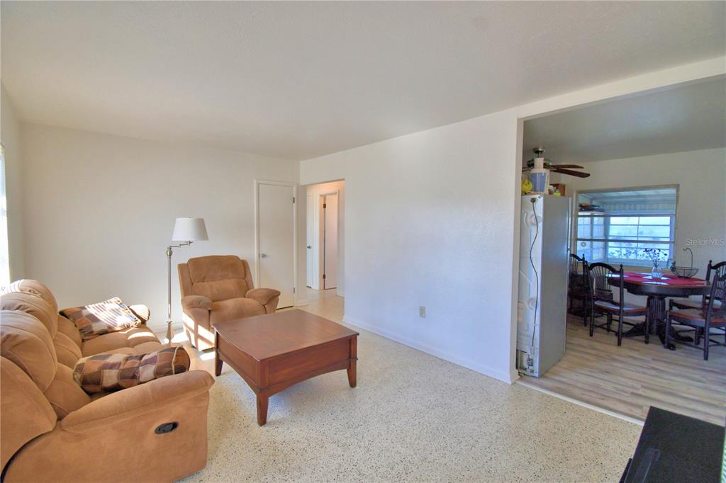 105 Maxcy Lane Frostproof, FL 33843 - Photo 4 of 49 a living room with furniture and a window