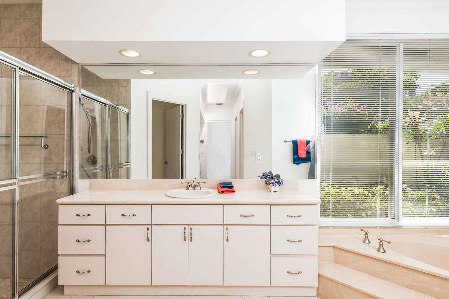 2245 Parkside Street Boca Raton, FL 33486 - Photo 18 of 34 a bathroom with a sink and a mirror