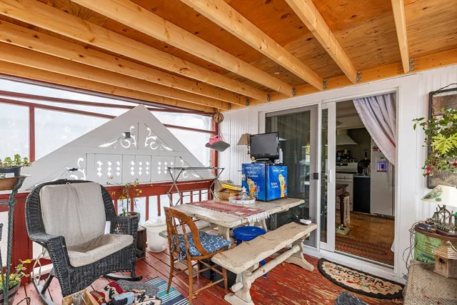 a view of living room filled with furniture