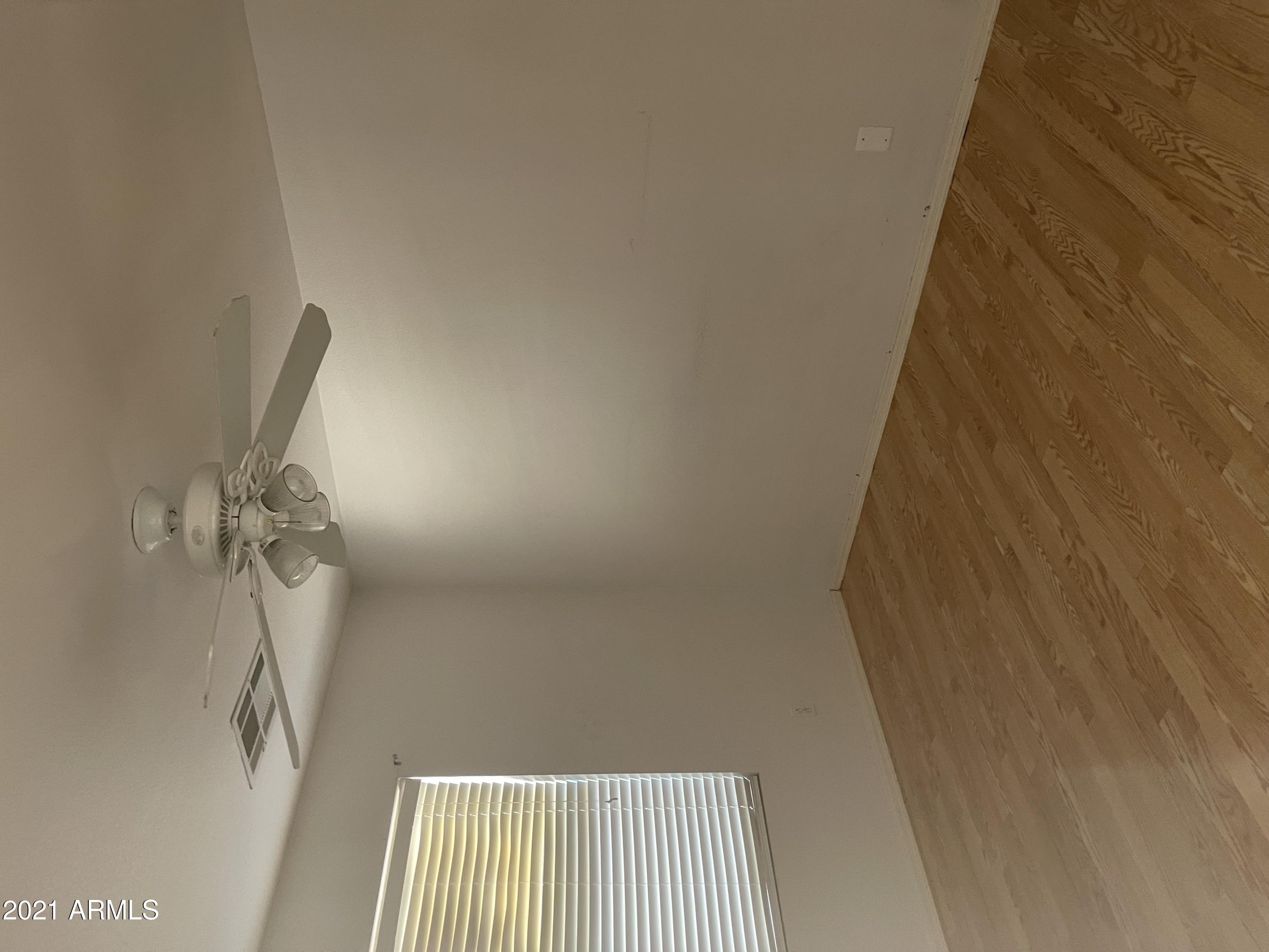 10642 East Arbor Avenue Mesa, AZ 85120 - Photo 2 of 12 a view of a room with a wooden door