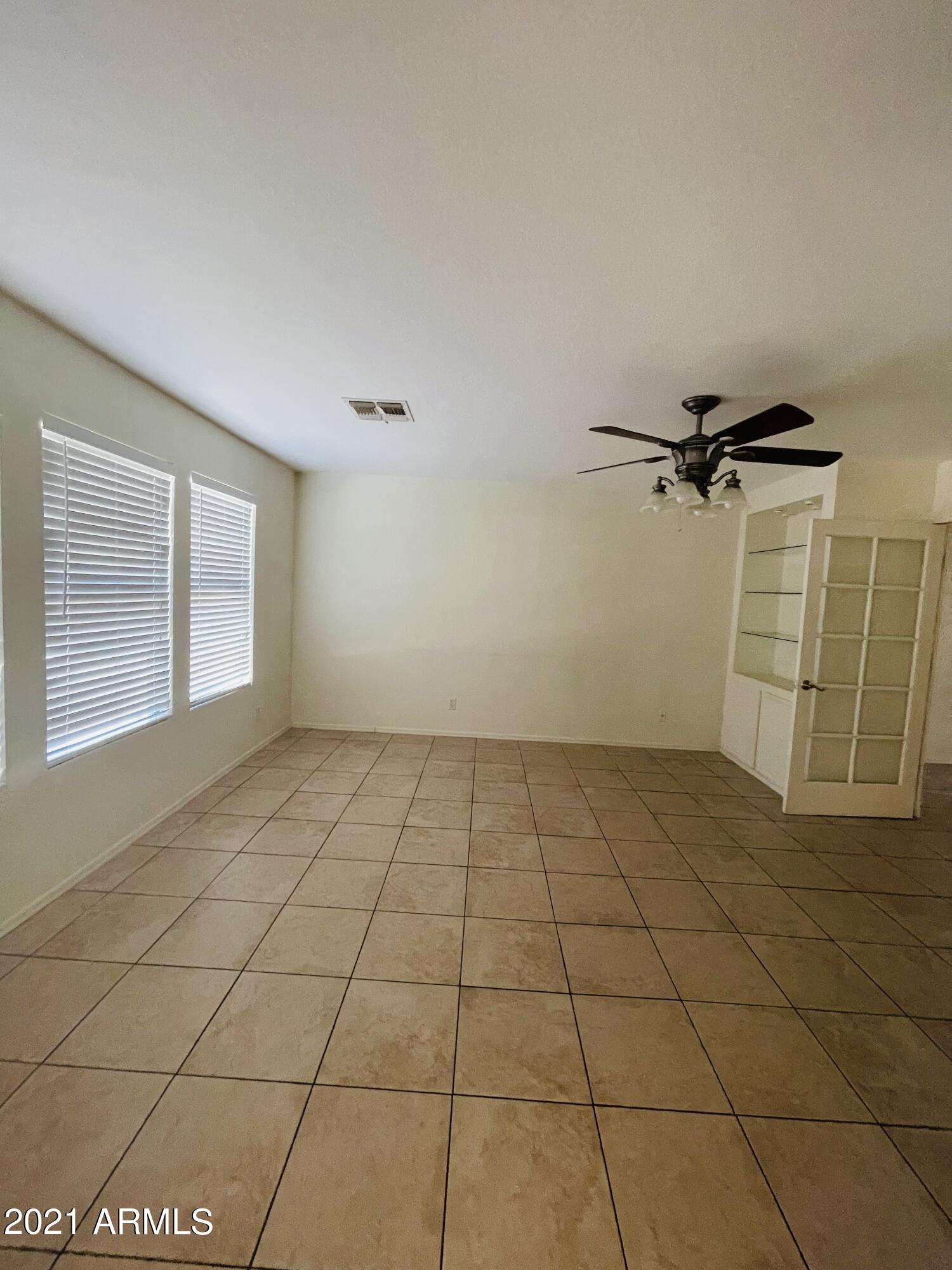 10642 East Arbor Avenue Mesa, AZ 85120 - Photo 6 of 12 a view of a room & utility room