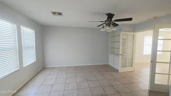 a view of an empty room with a window