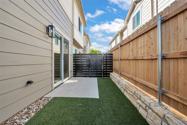a view of a back yard of the house