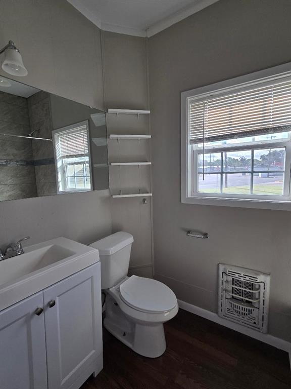 114 South 20th Street Corsicana, TX 75110 - Photo 7 of 15 a white toilet sitting next to a bathroom sink