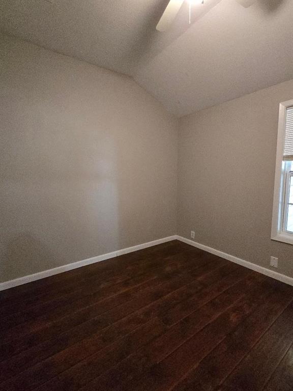 114 South 20th Street Corsicana, TX 75110 - Photo 10 of 15 a view of an empty room with wooden floor and a window