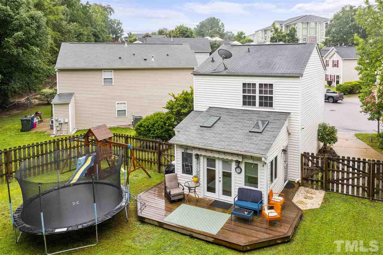 7050 Jeffreys Creek Lane Raleigh, NC 27616 - Photo 20 of 23 aerial view of a house with swimming pool and porch