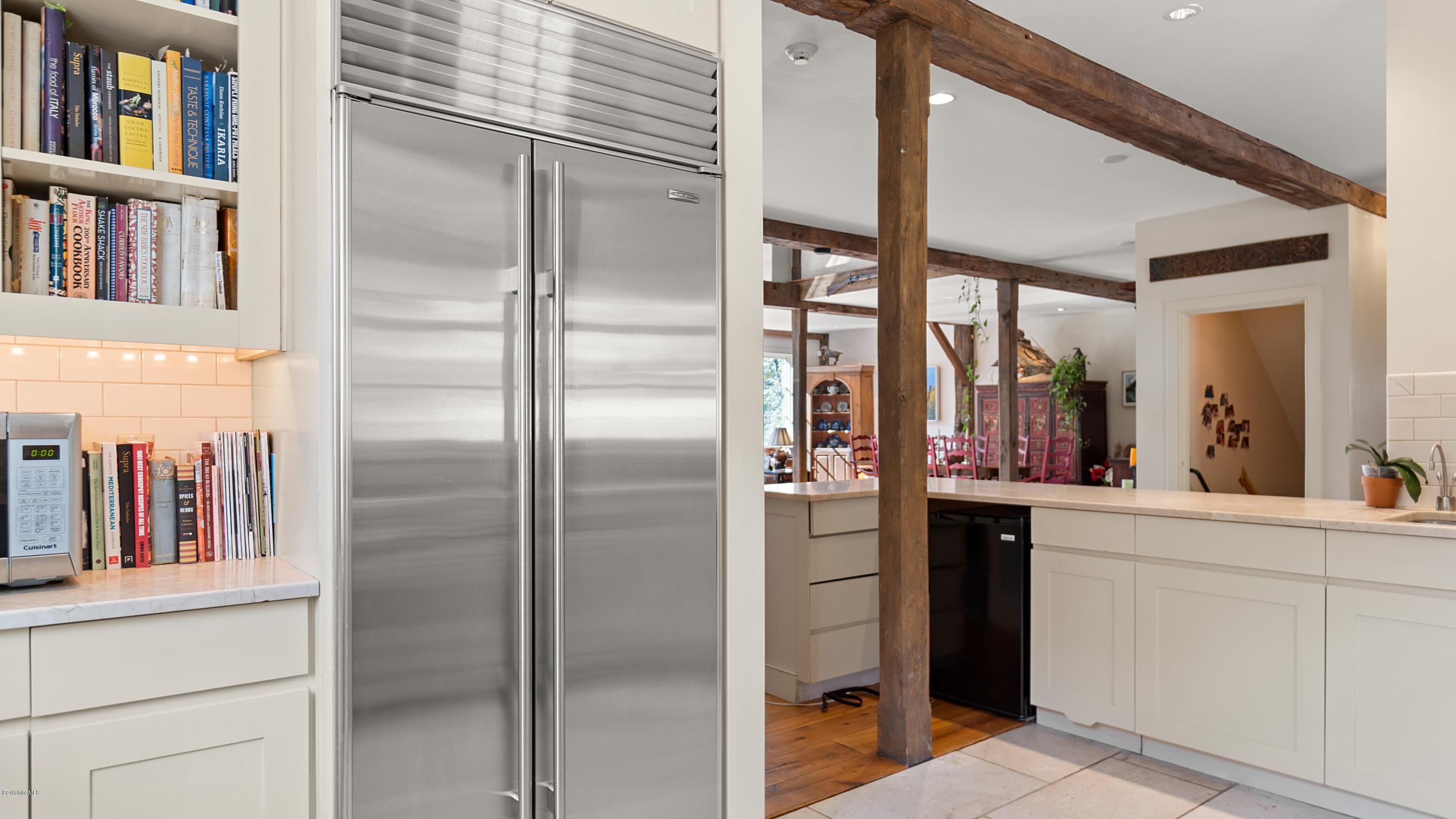 1204 Ashley Falls Road Sheffield, MA 01257 - Photo 13 of 55 a kitchen with stainless steel appliances granite countertop a refrigerator and a sink