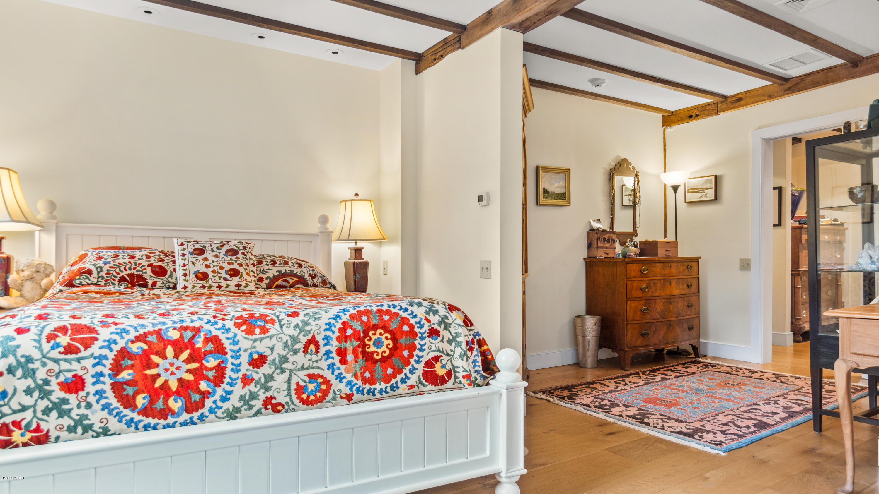 1204 Ashley Falls Road Sheffield, MA 01257 - Photo 17 of 55 a bedroom with a bed and wooden floor