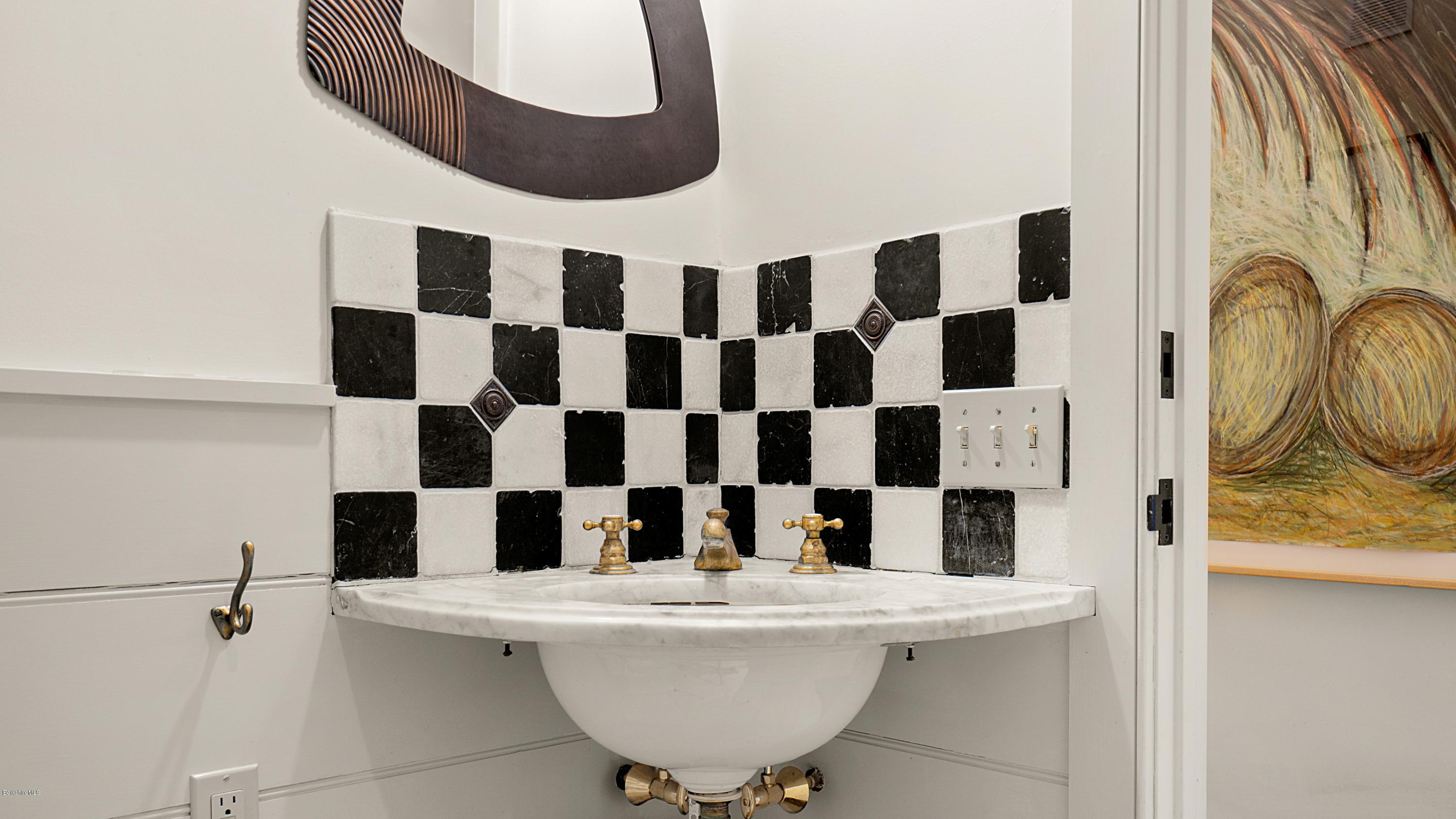 1204 Ashley Falls Road Sheffield, MA 01257 - Photo 24 of 55 a bathroom with a sink a toilet and a mirror