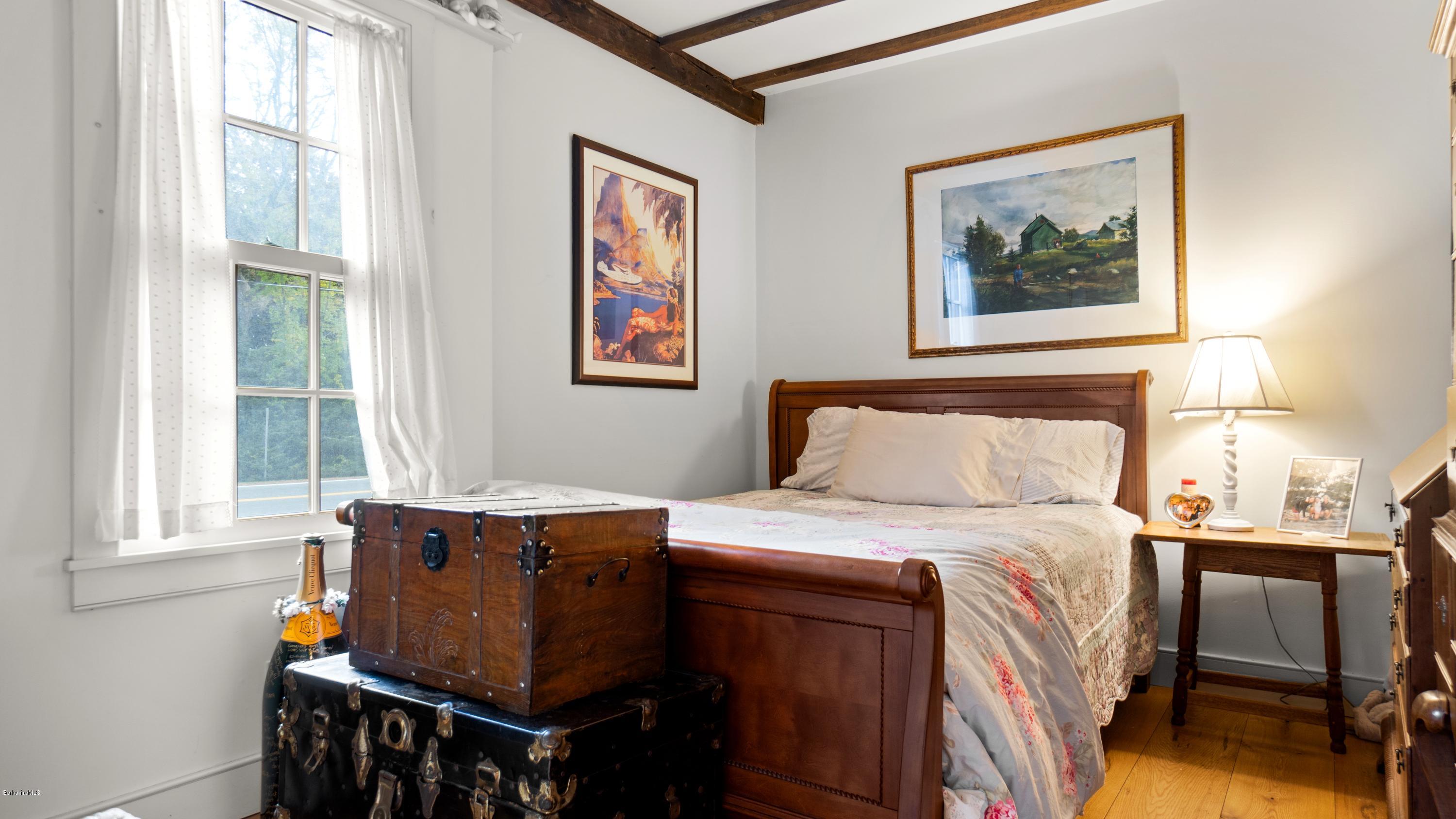 1204 Ashley Falls Road Sheffield, MA 01257 - Photo 27 of 55 a bedroom with a bed and a window