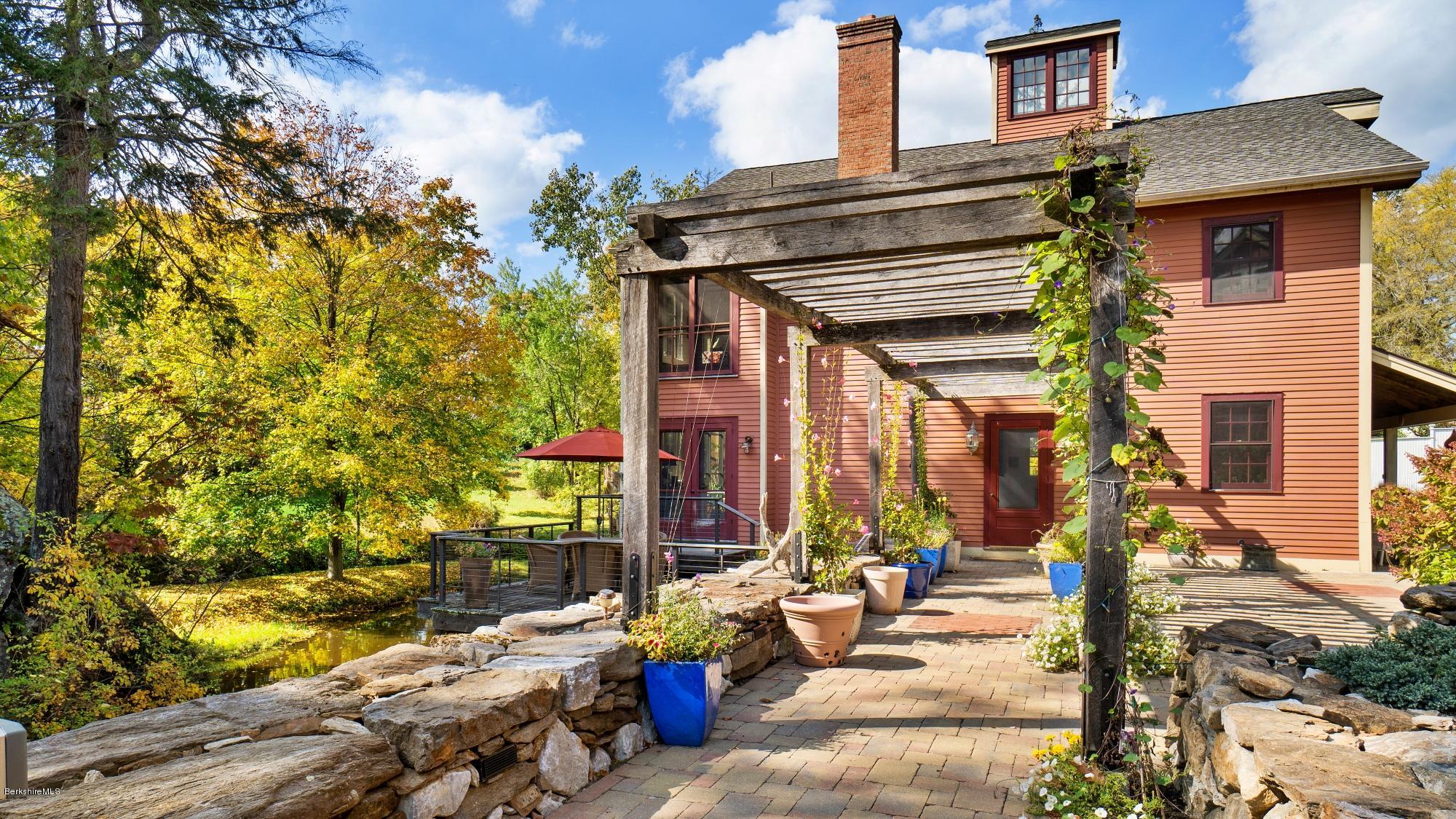 1204 Ashley Falls Road Sheffield, MA 01257 - Photo 4 of 55 a view of a house with a patio