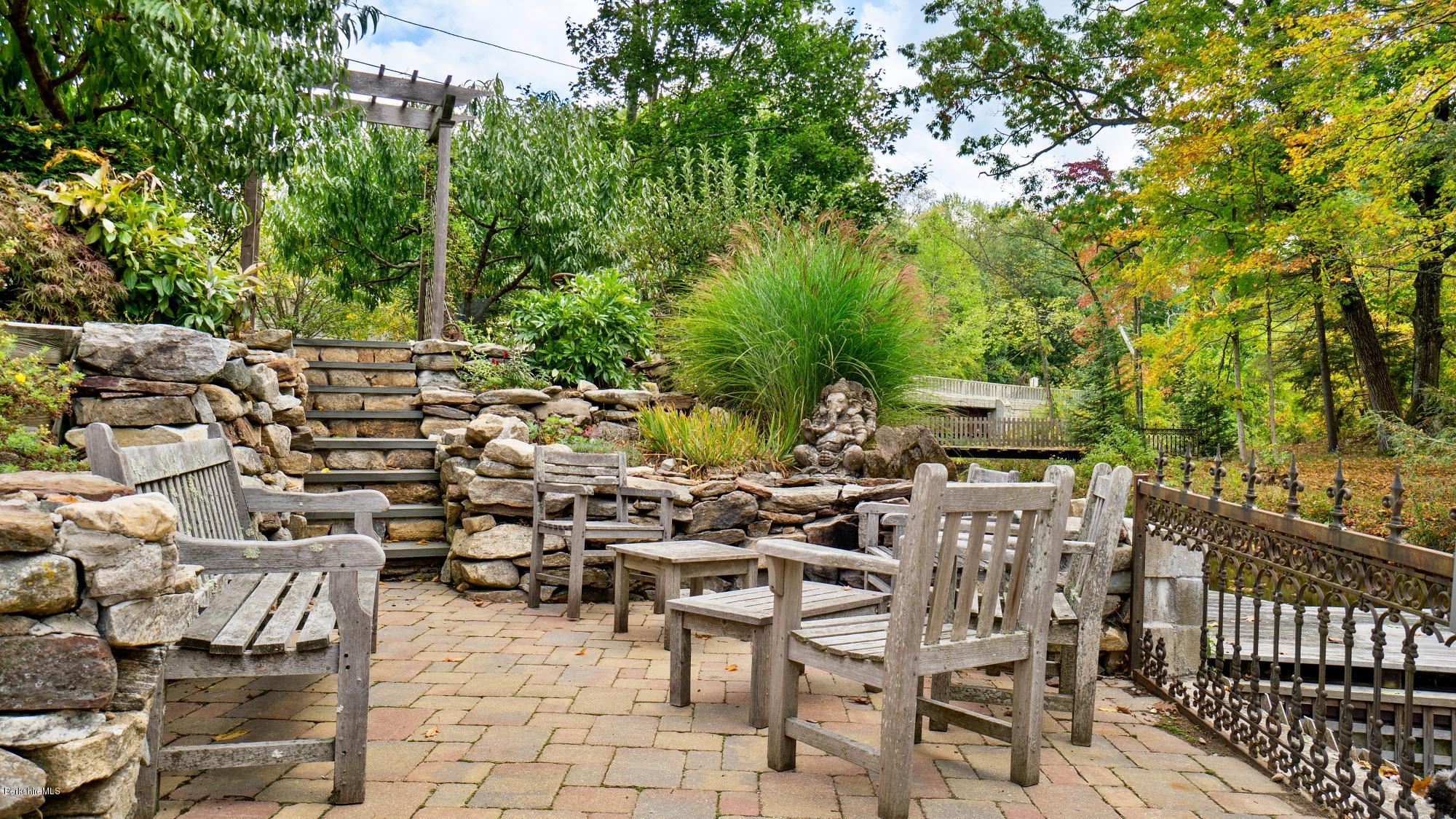1204 Ashley Falls Road Sheffield, MA 01257 - Photo 45 of 55 a view of a chairs and table in a patio
