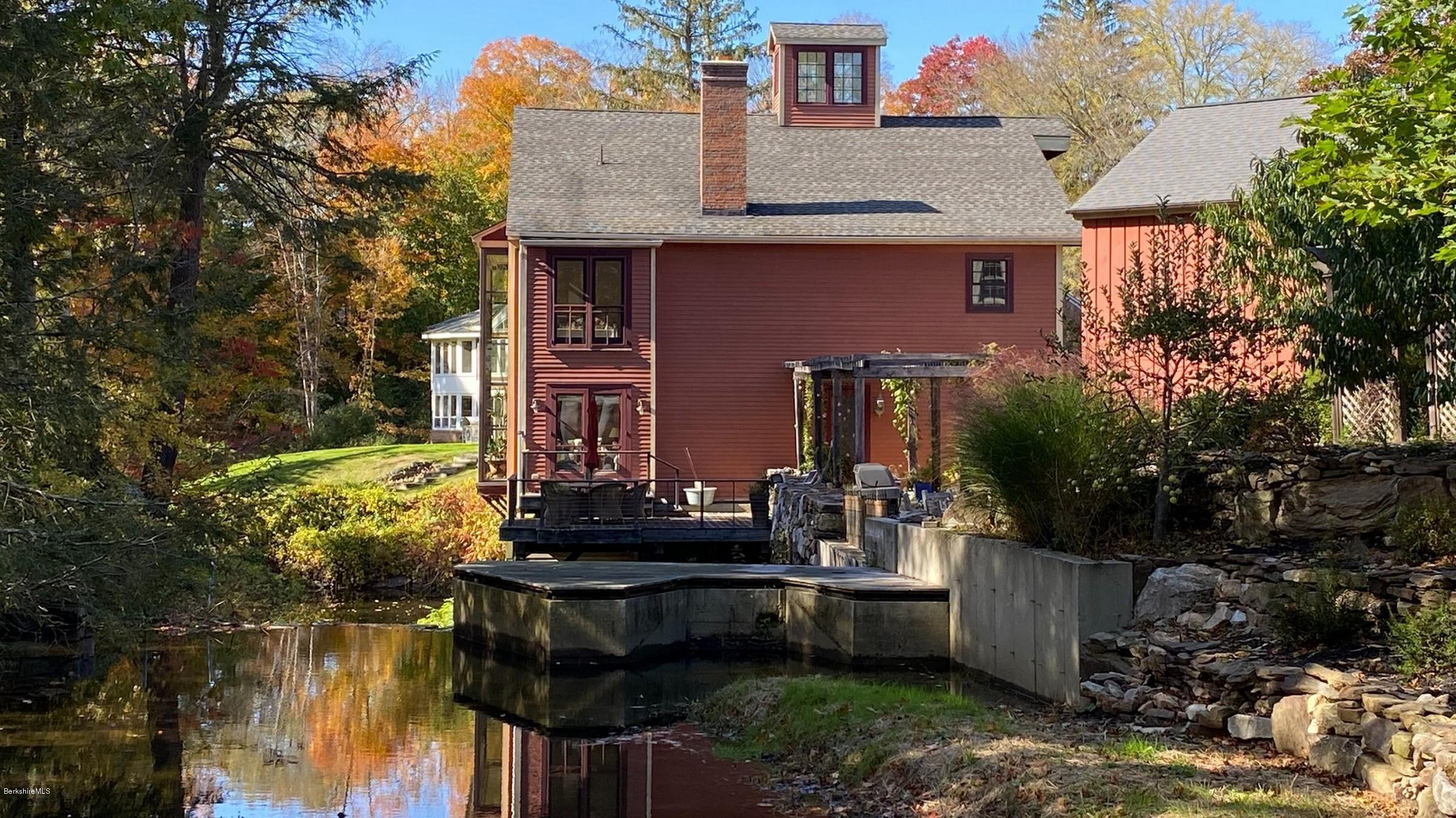 1204 Ashley Falls Road Sheffield, MA 01257 - Photo 49 of 55 a front view of a house with a garden