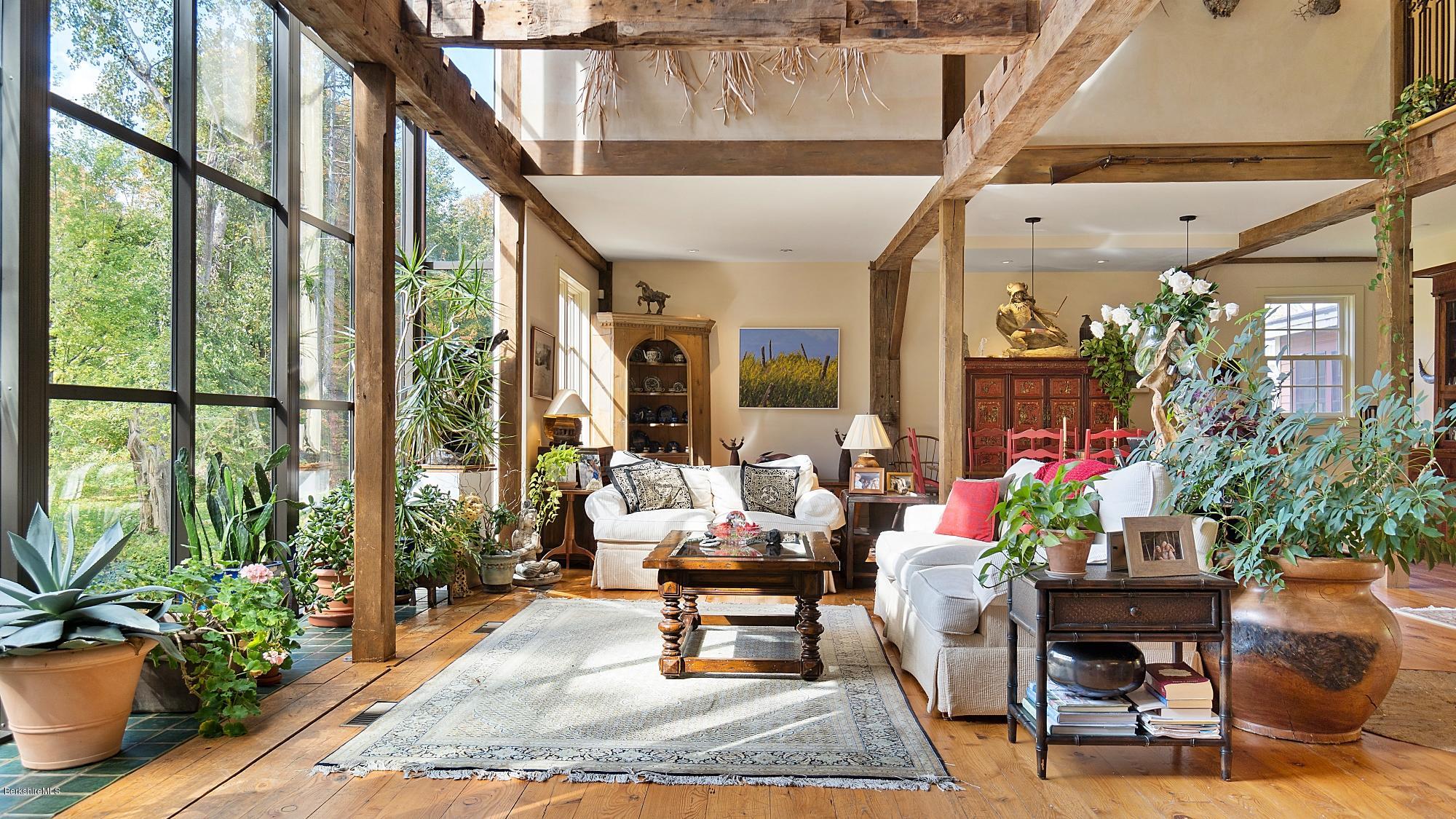 1204 Ashley Falls Road Sheffield, MA 01257 - Photo 6 of 55 a living room with furniture and flowers