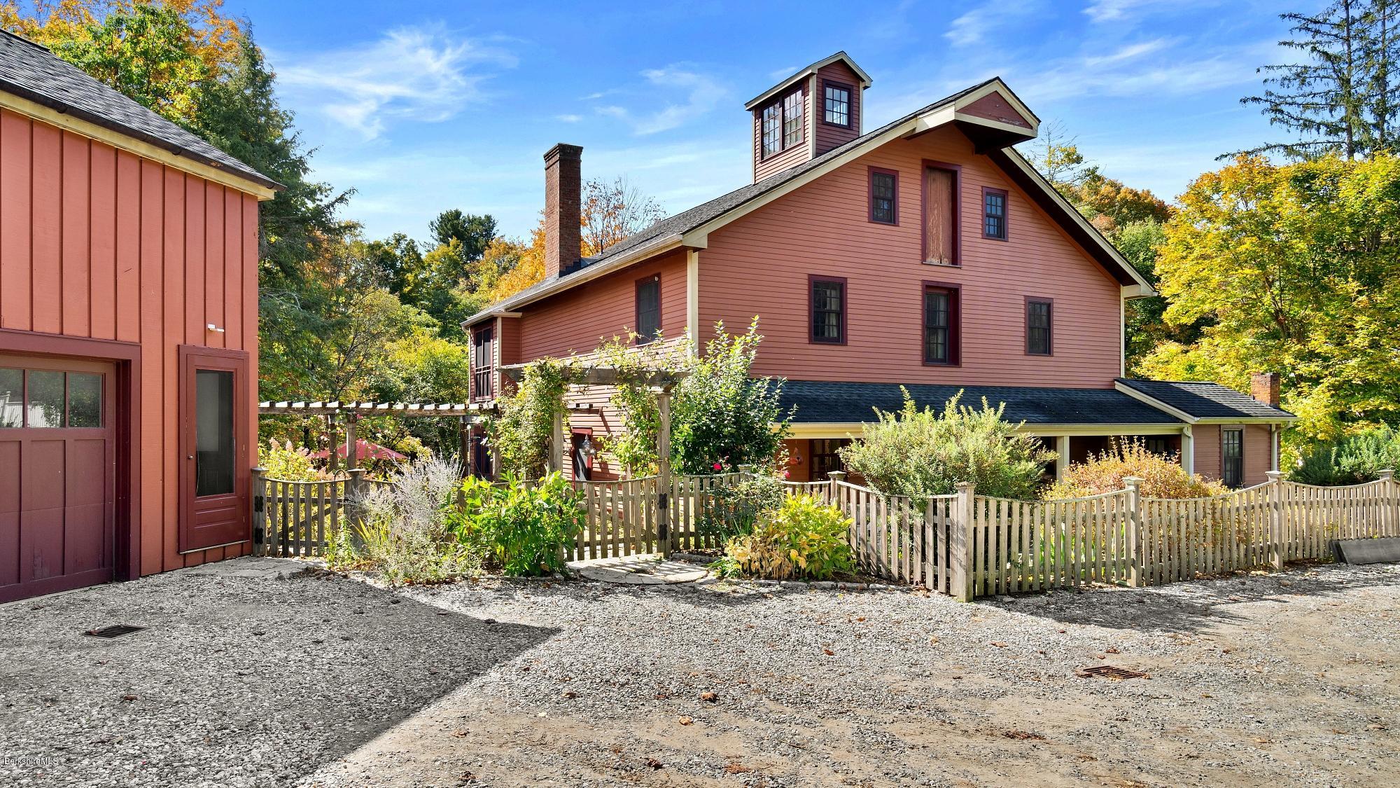 1204 Ashley Falls Road Sheffield, MA 01257 - Photo 55 of 55 a front view of a house with a yard