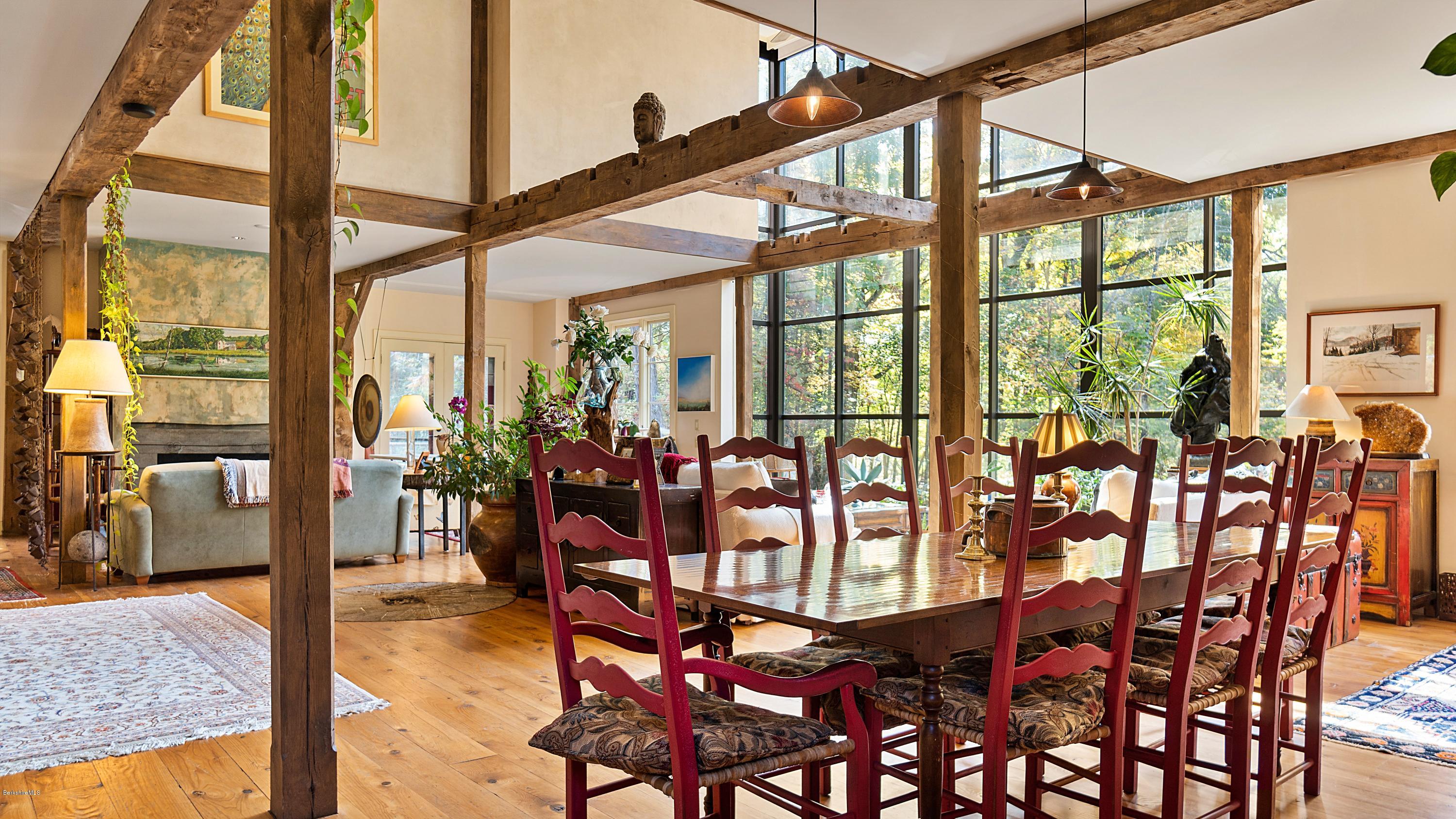 1204 Ashley Falls Road Sheffield, MA 01257 - Photo 7 of 55 a view of a dining room with furniture and floor to ceiling windows