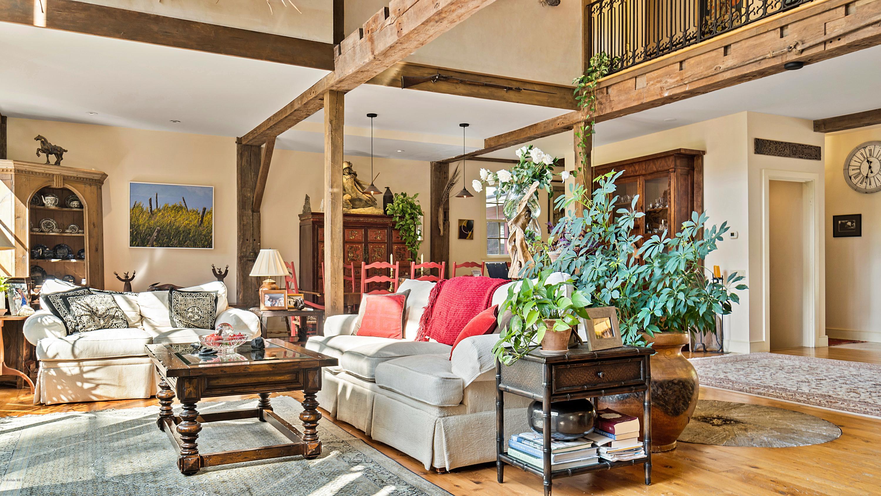 1204 Ashley Falls Road Sheffield, MA 01257 - Photo 8 of 55 a living room with patio furniture and a potted plant