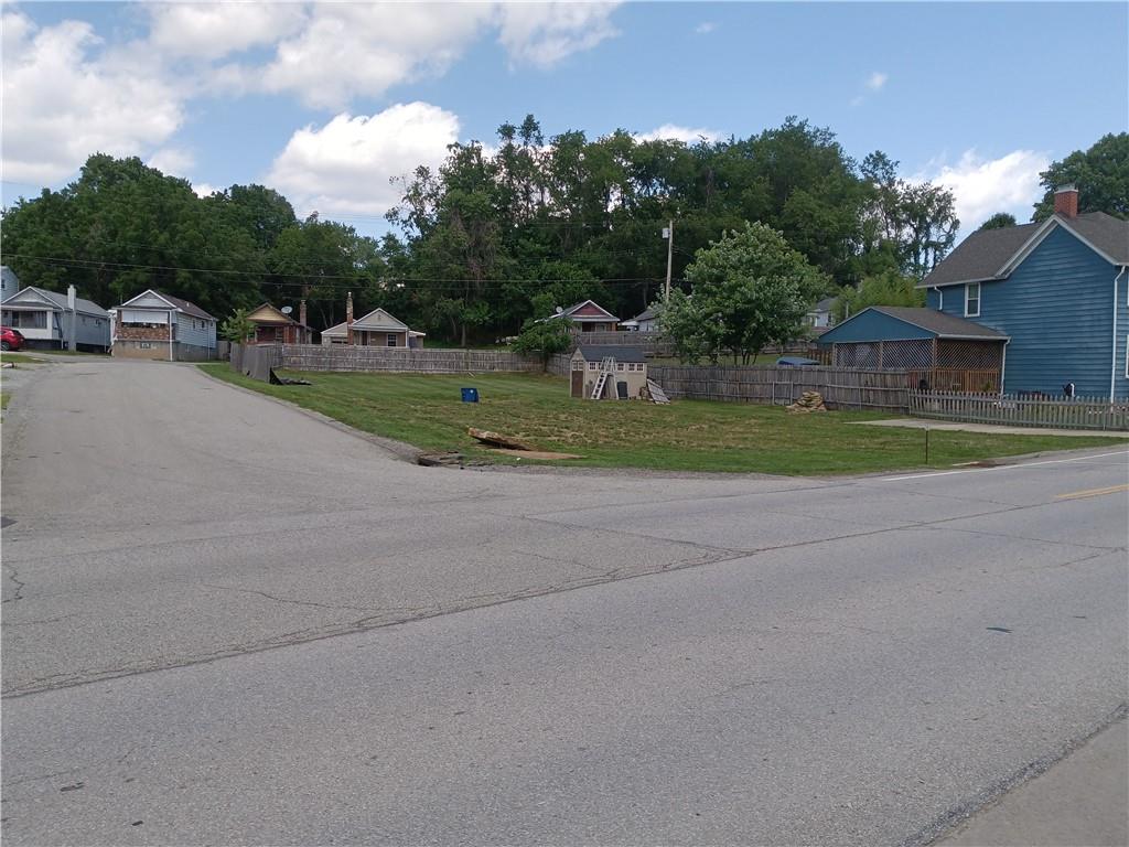 a view of street with a houses