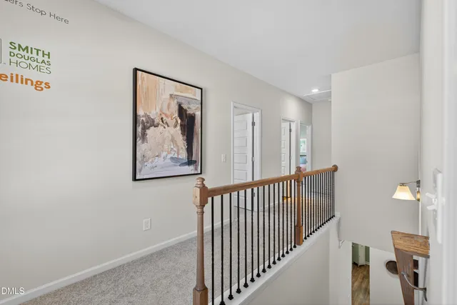 a view of a hallway with entryway and closet