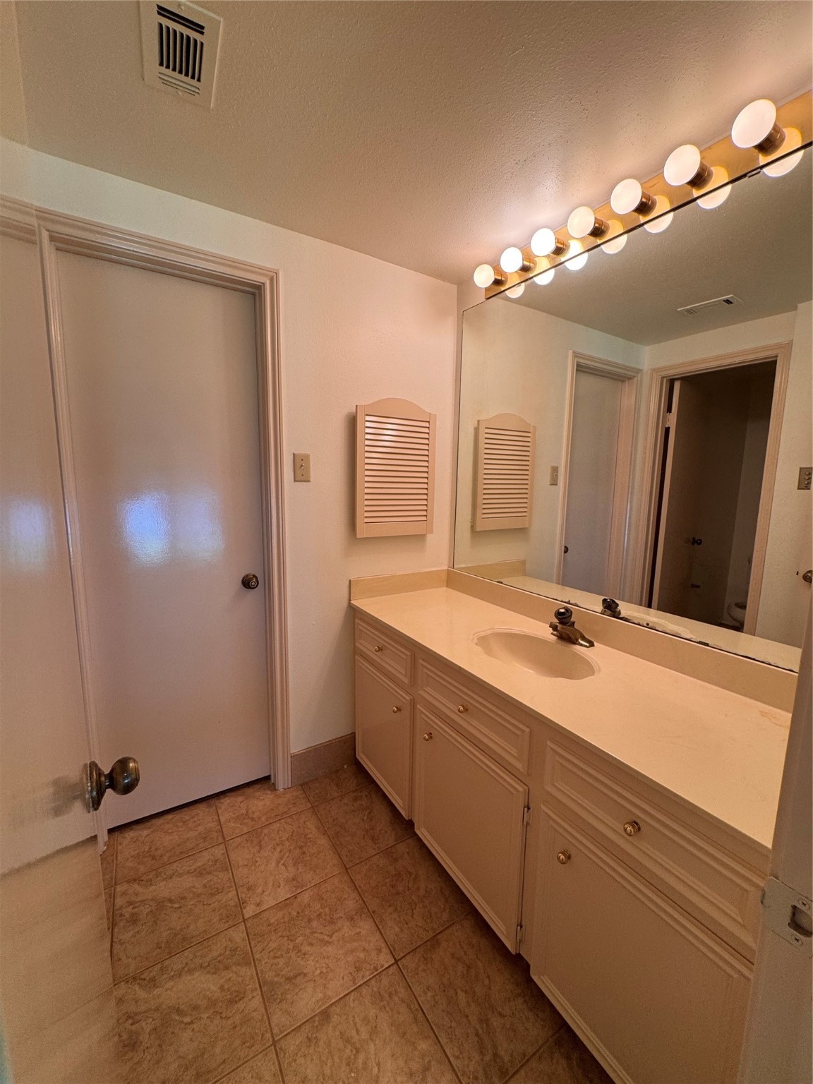 134 April Point Drive South Conroe, TX 77356 - Photo 12 of 31 a spacious bathroom with a double vanity sink a mirror and a shower