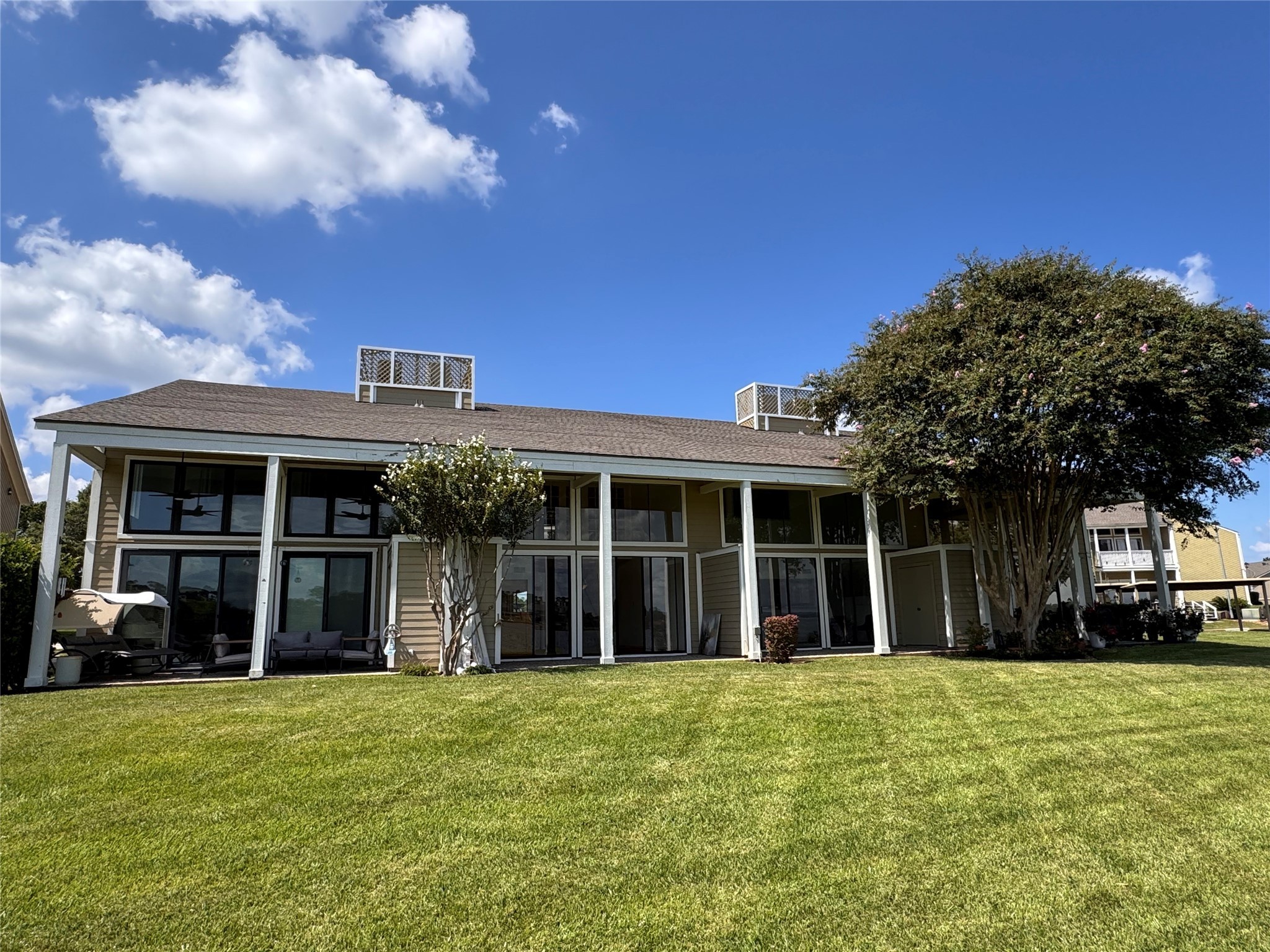 134 April Point Drive South Conroe, TX 77356 - Photo 16 of 31 a view of a house with a garden and pathway