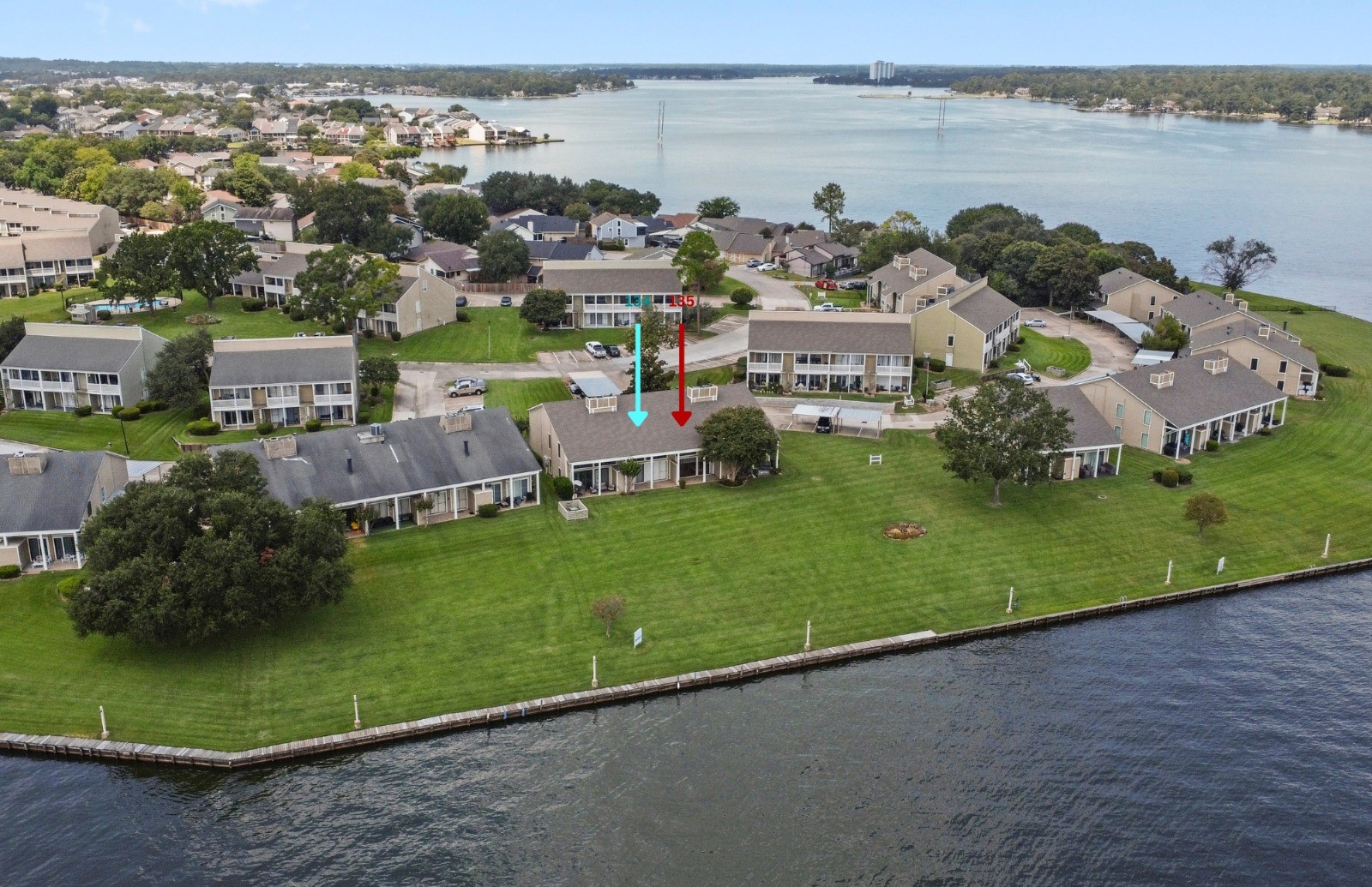 134 April Point Drive South Conroe, TX 77356 - Photo 2 of 31 a view of a lake with outdoor space