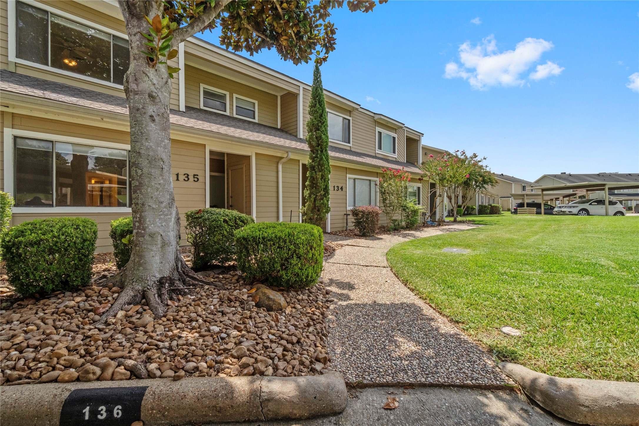 134 April Point Drive South Conroe, TX 77356 - Photo 21 of 31 a front view of a house with a yard