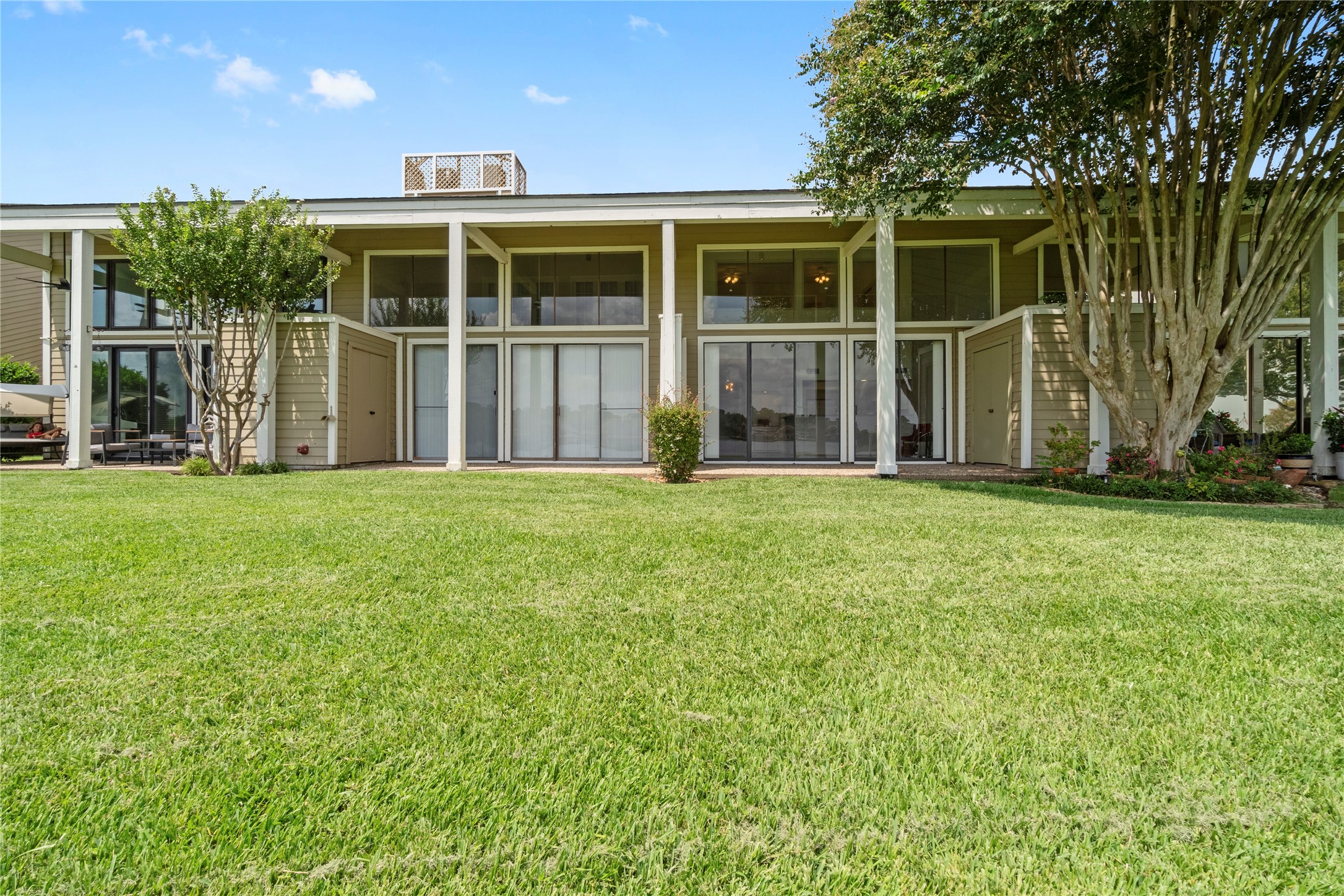 134 April Point Drive South Conroe, TX 77356 - Photo 26 of 31 a view of a house that has a garden