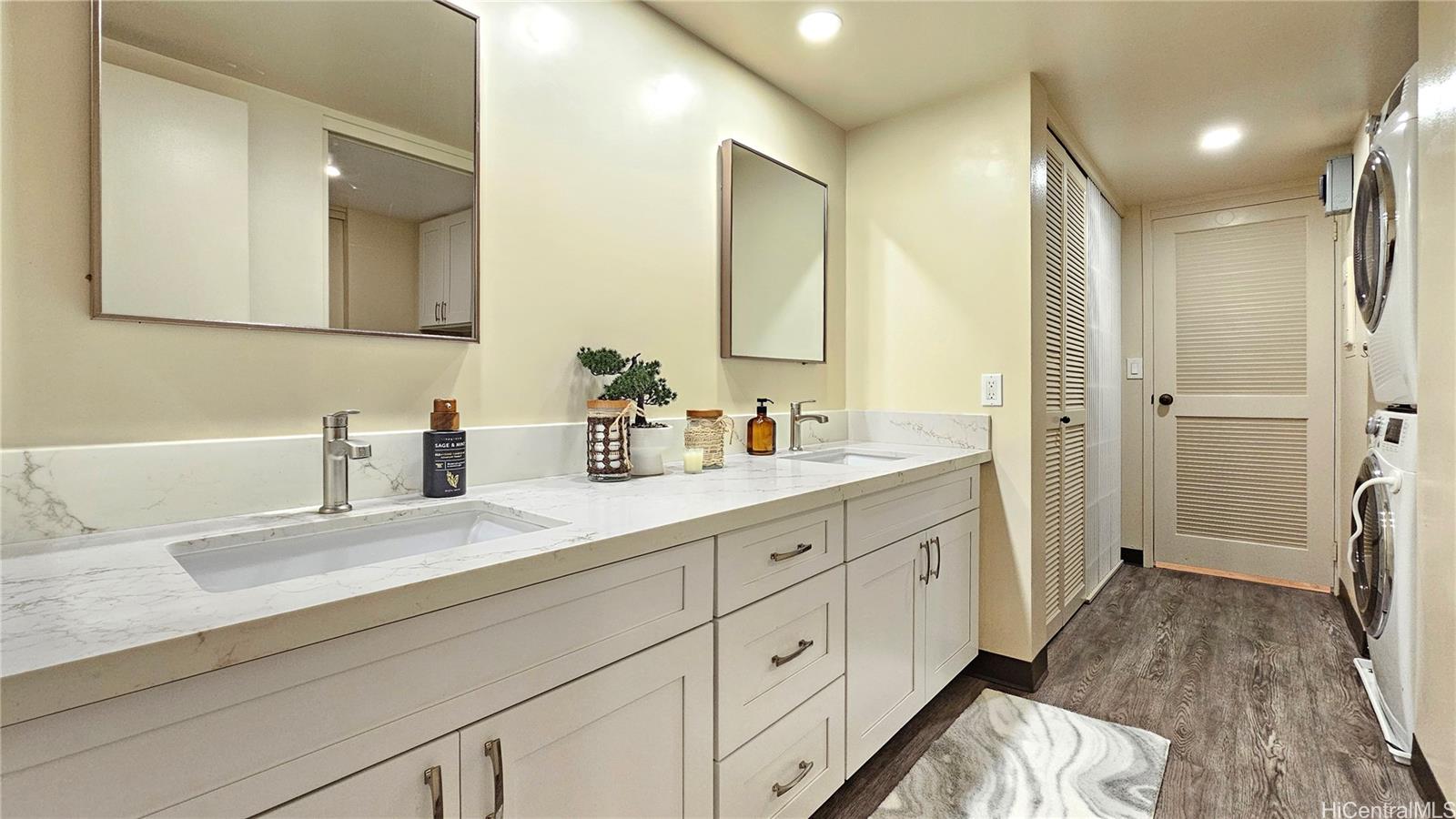217 Prospect Street, Unit D16 Honolulu, HI 96813 - Photo 10 of 23 a spacious bathroom with a double vanity sink a mirror and a shower