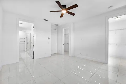 a bathroom with a sink double vanity and a mirror