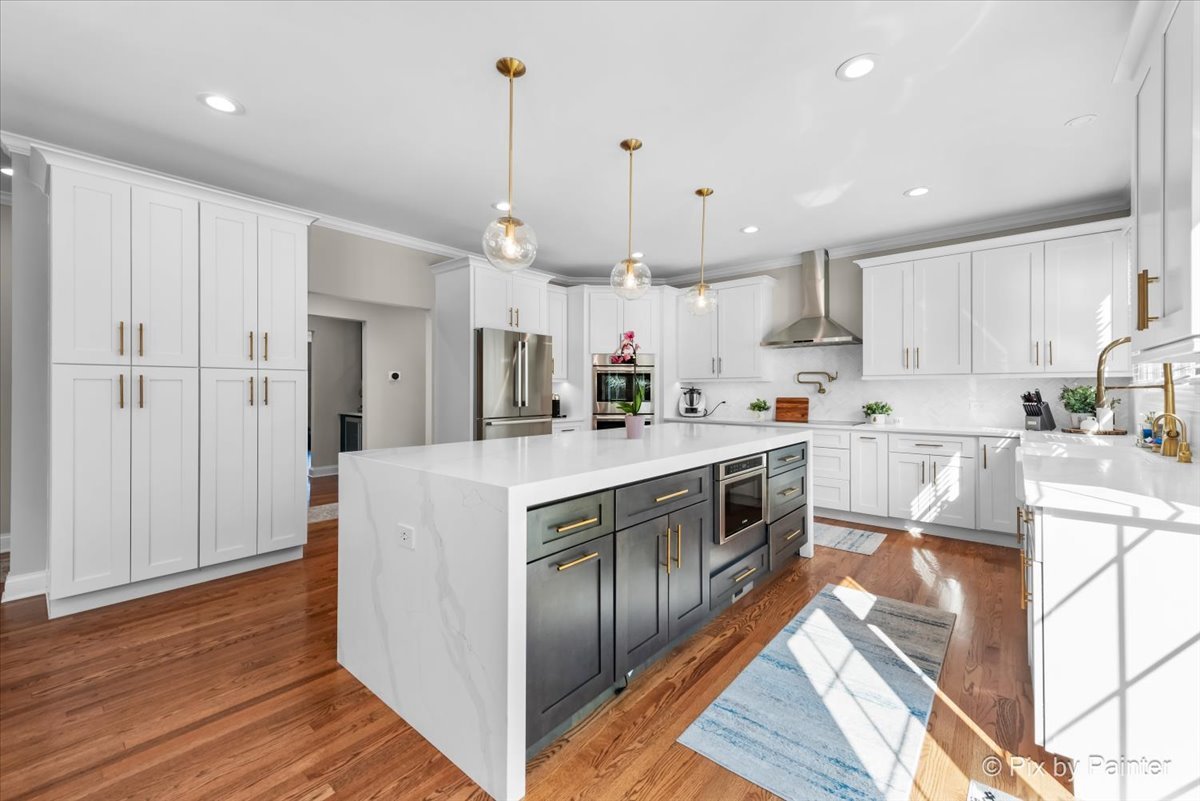 36W575 Bristol Road St. Charles, IL 60175 - Photo 14 of 58 a kitchen with kitchen island granite countertop a sink a counter top stainless steel appliances and cabinets