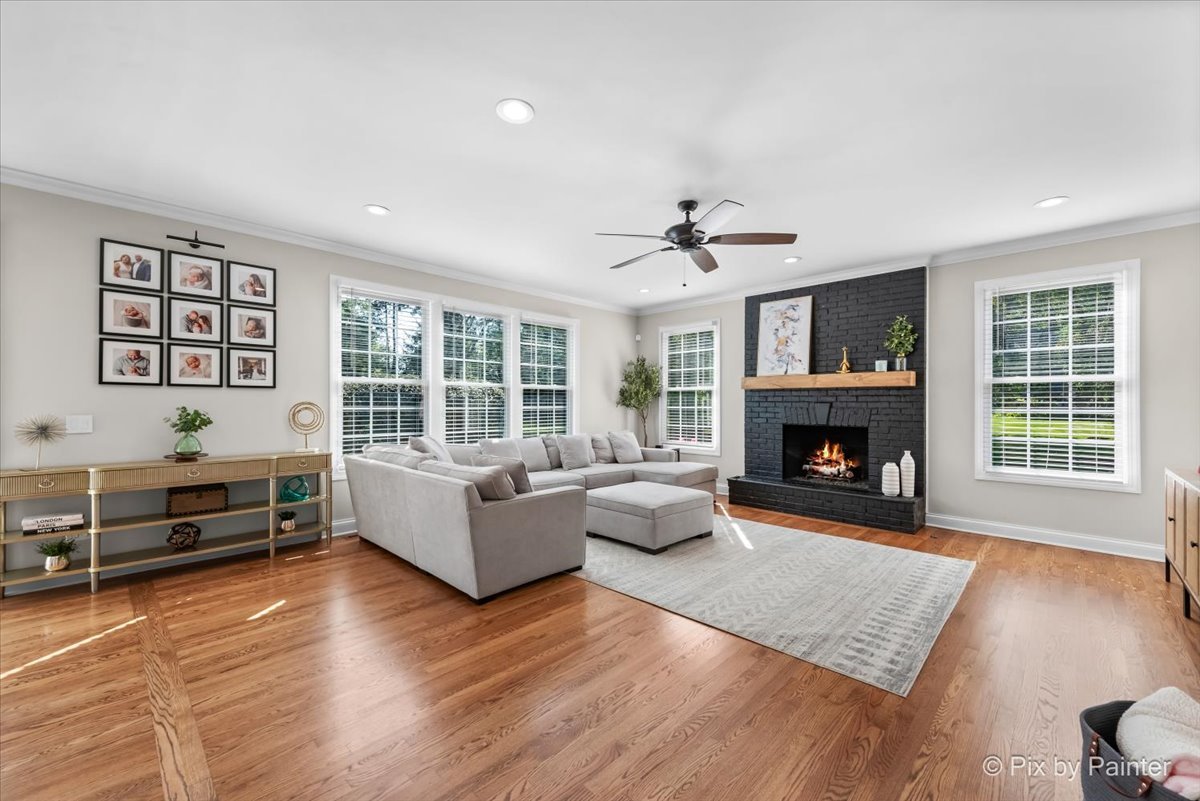 36W575 Bristol Road St. Charles, IL 60175 - Photo 17 of 58 a living room with furniture and a fireplace