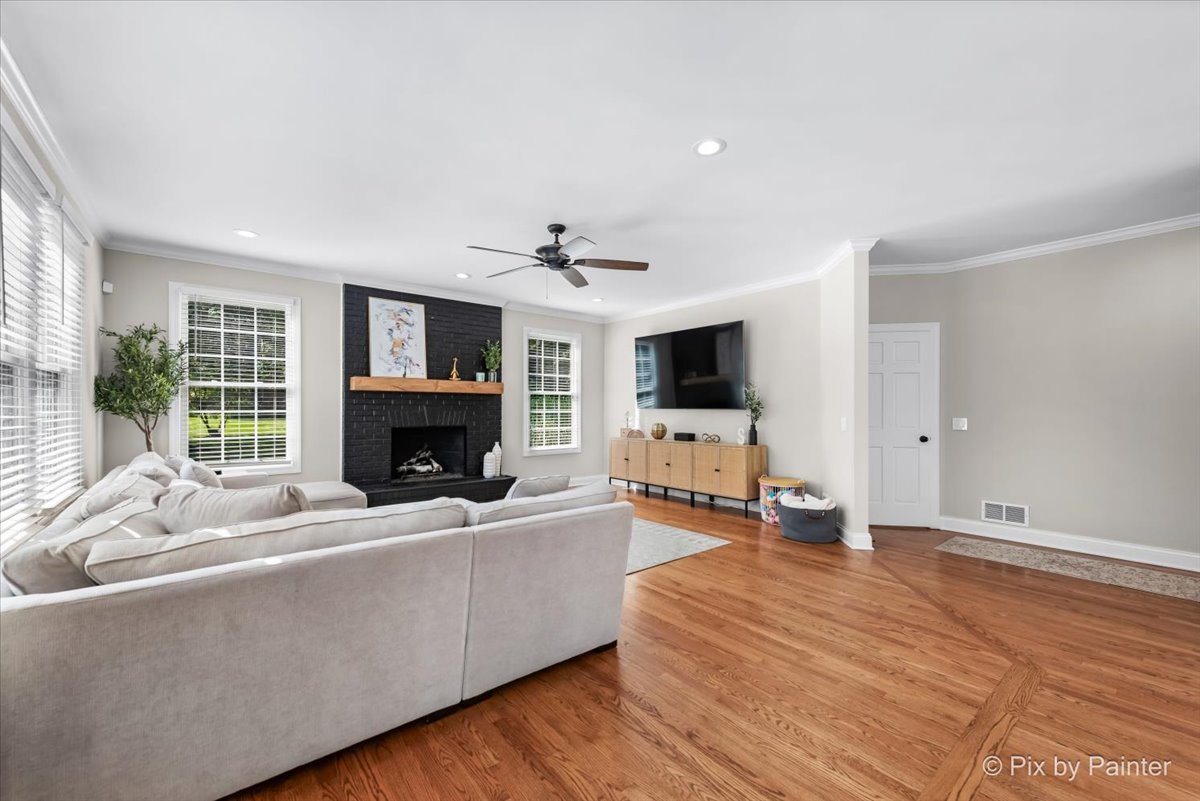 36W575 Bristol Road St. Charles, IL 60175 - Photo 19 of 58 a living room with furniture and a fireplace