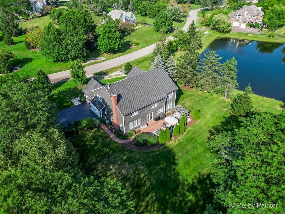 36W575 Bristol Road St. Charles, IL 60175 - Photo 2 of 58 an aerial view of a house with a yard and lake view