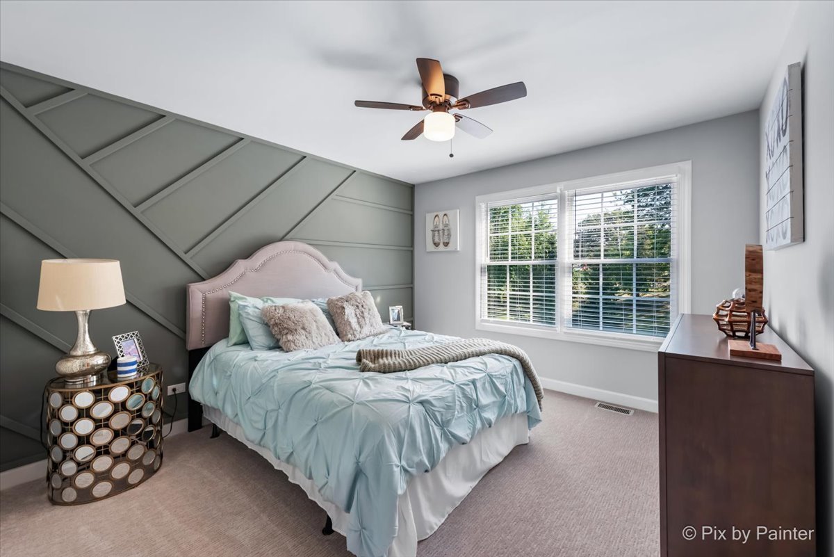 36W575 Bristol Road St. Charles, IL 60175 - Photo 31 of 58 a bedroom with a bed and a large window