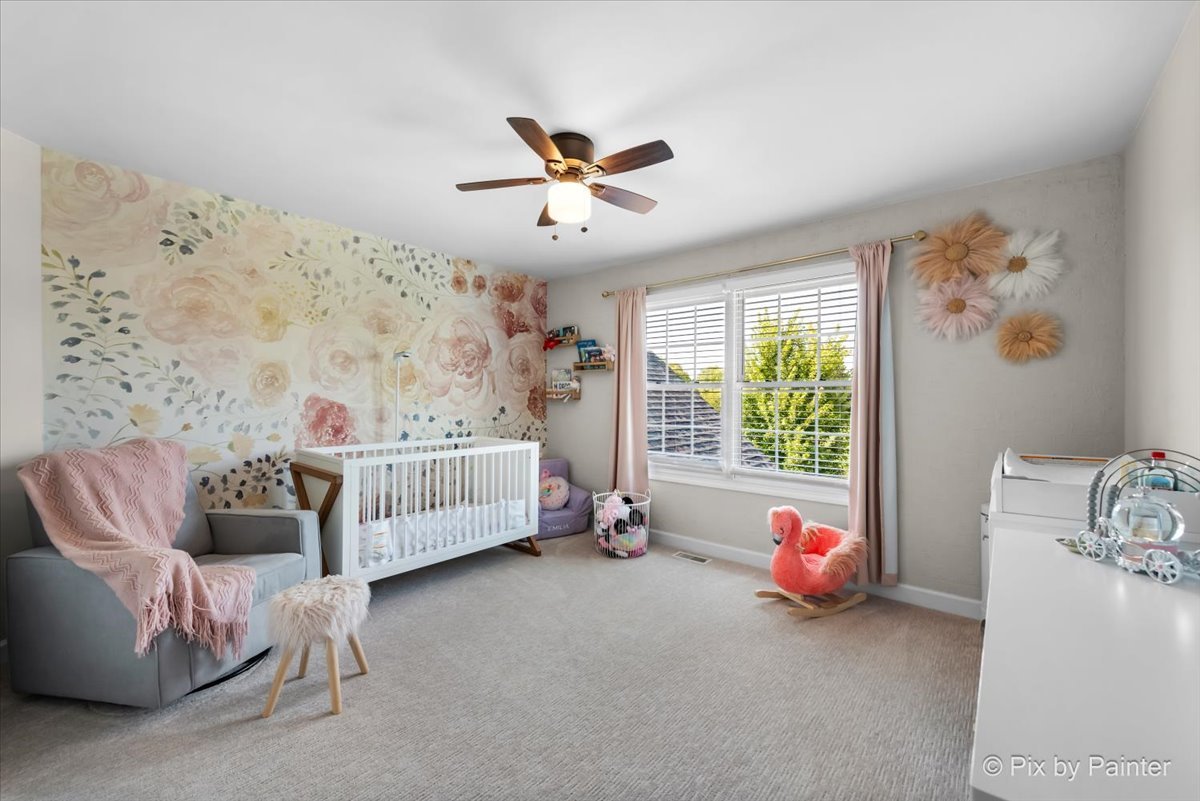 36W575 Bristol Road St. Charles, IL 60175 - Photo 34 of 58 a bedroom with a bed and a couch