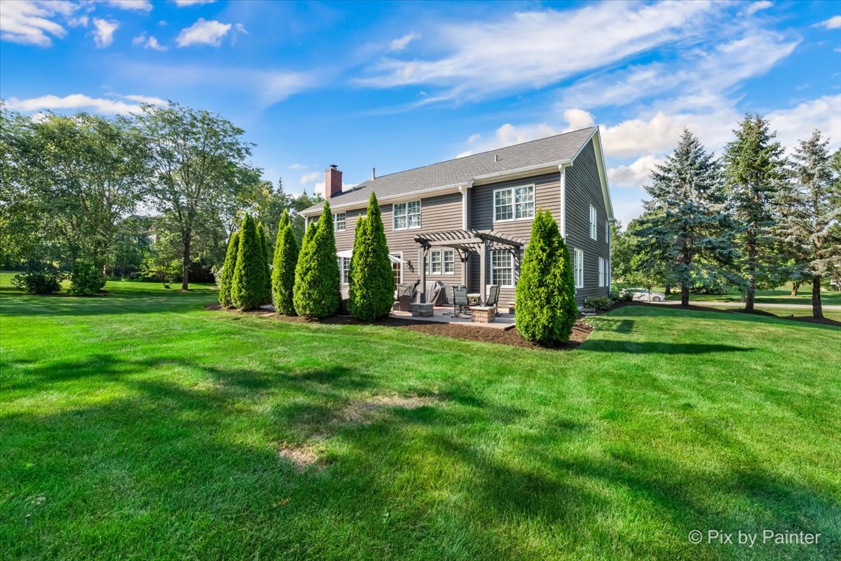 36W575 Bristol Road St. Charles, IL 60175 - Photo 50 of 58 a house view with a garden space