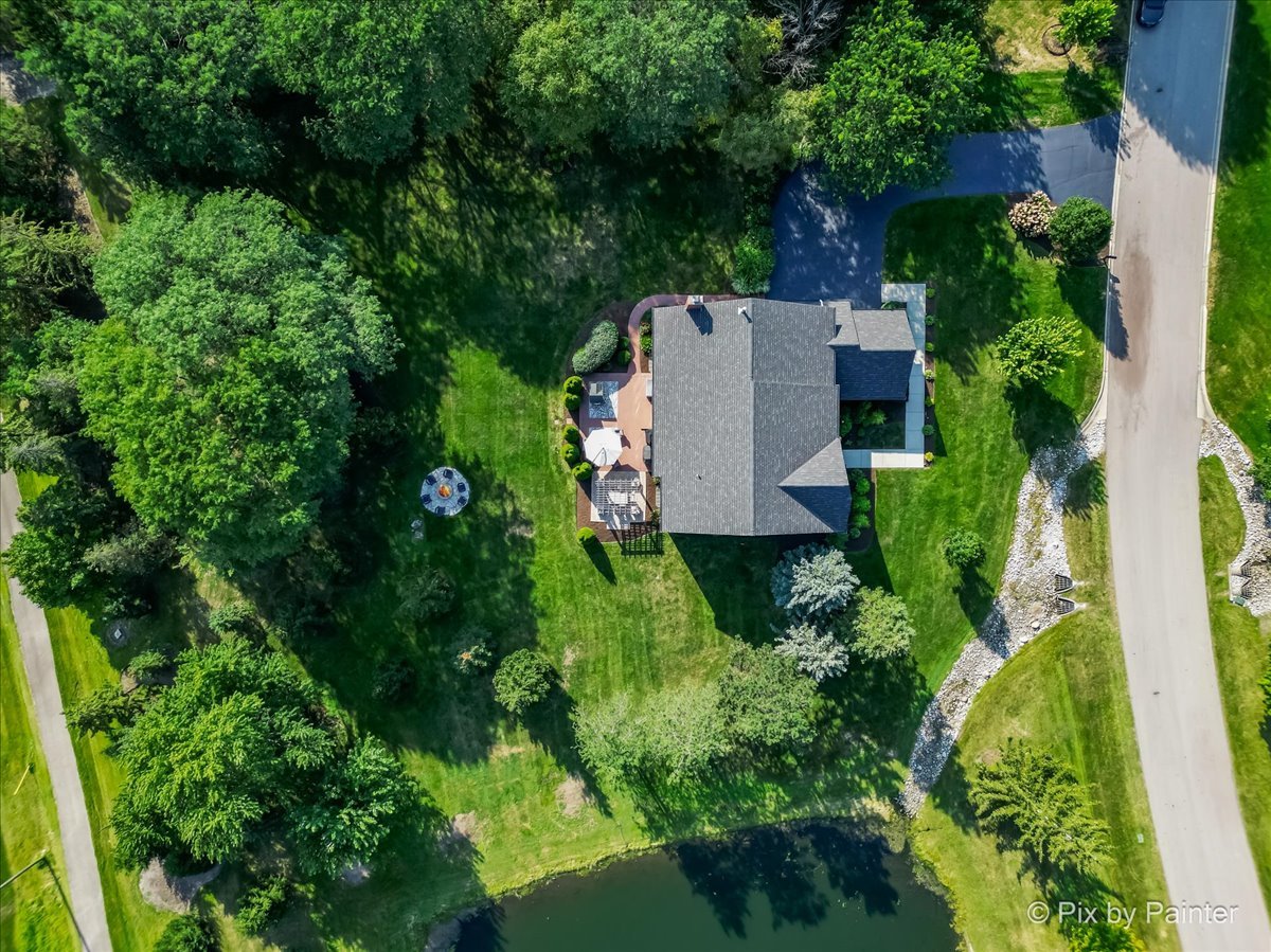 36W575 Bristol Road St. Charles, IL 60175 - Photo 54 of 58 an aerial view of residential house with outdoor space and trees all around