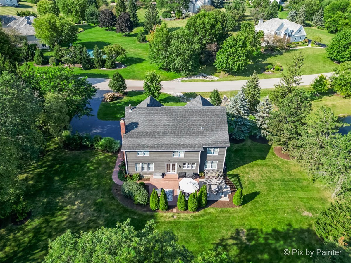 36W575 Bristol Road St. Charles, IL 60175 - Photo 56 of 58 an aerial view of a house with swimming pool patio and outdoor seating