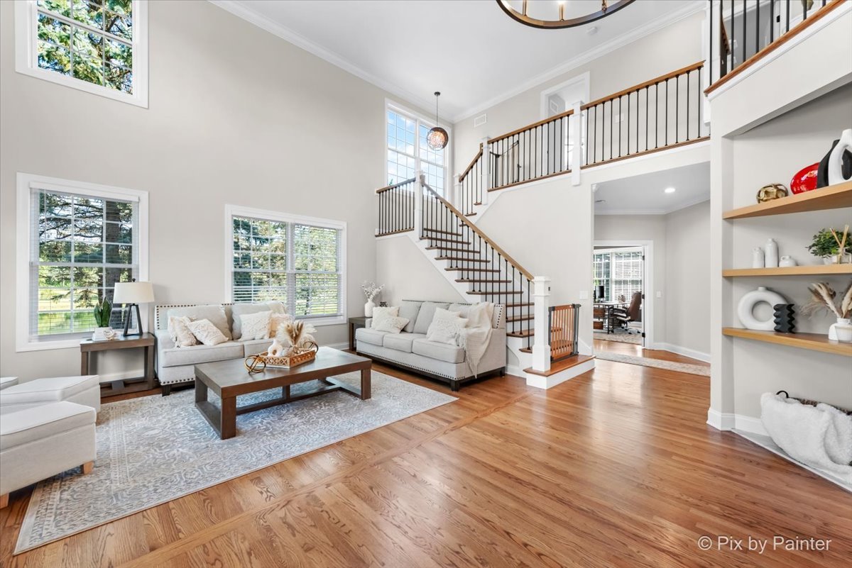 36W575 Bristol Road St. Charles, IL 60175 - Photo 7 of 58 a living room with furniture and a wooden floor