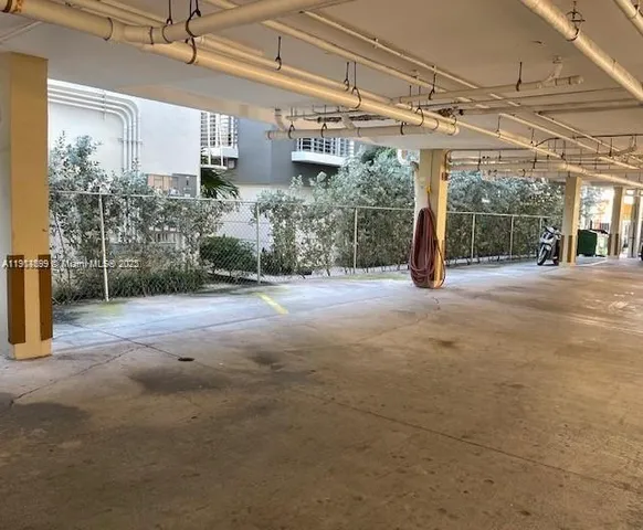 a view of a house with porch and wooden stairs