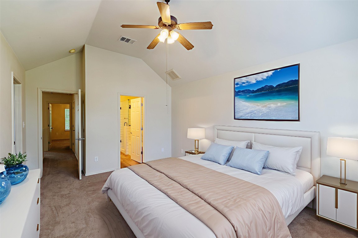 2632 Century Park Boulevard, Unit 18 Austin, TX 78727 - Photo 14 of 32 Bedroom featuring carpet, high vaulted ceiling, ceiling fan, and ensuite bathroom