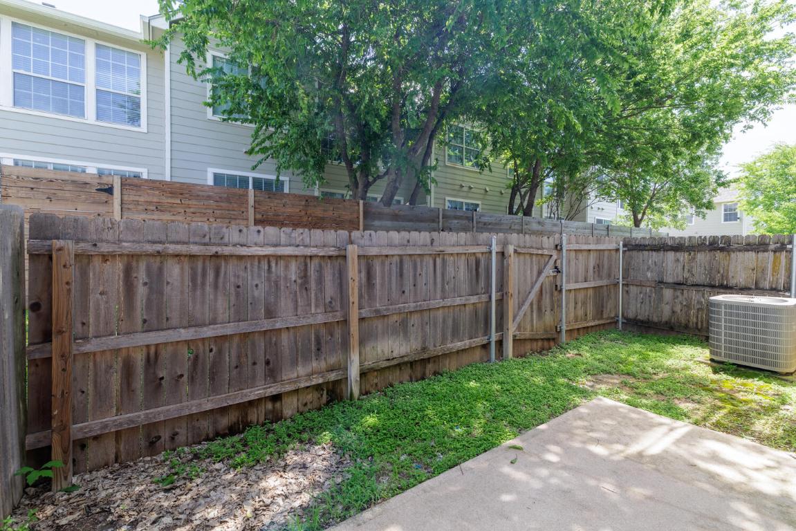 2632 Century Park Boulevard, Unit 18 Austin, TX 78727 - Photo 30 of 32 View of fenced backyard