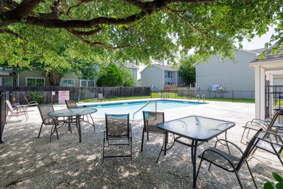 2632 Century Park Boulevard, Unit 18 Austin, TX 78727 - Photo 32 of 32 Community pool with a patio area