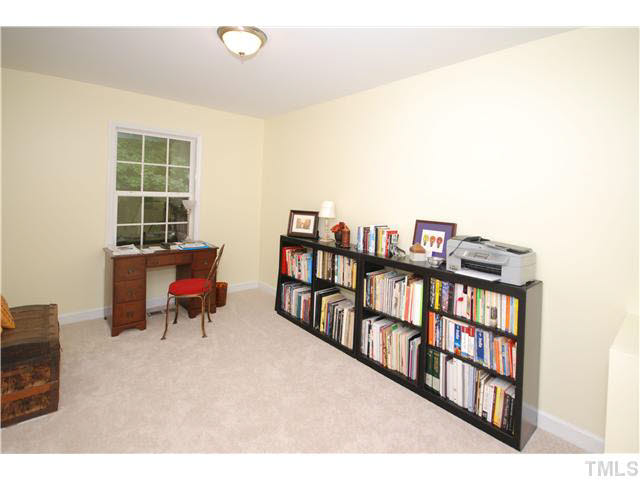 1072 Mills Street Raleigh, NC 27608 - Photo 19 of 25 a view of a workspace with furniture