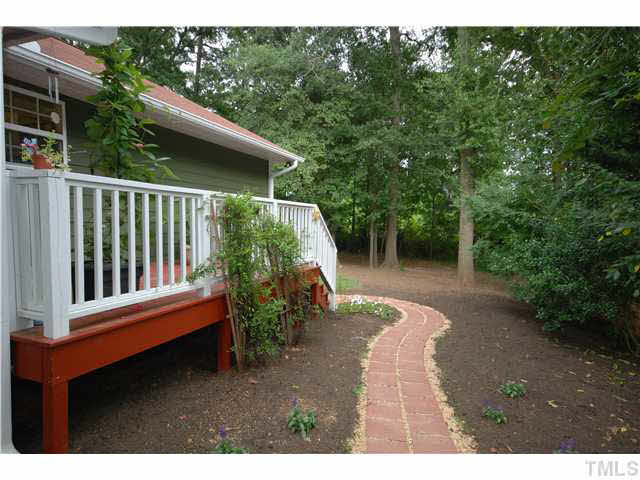 1072 Mills Street Raleigh, NC 27608 - Photo 21 of 25 a view of backyard with green space