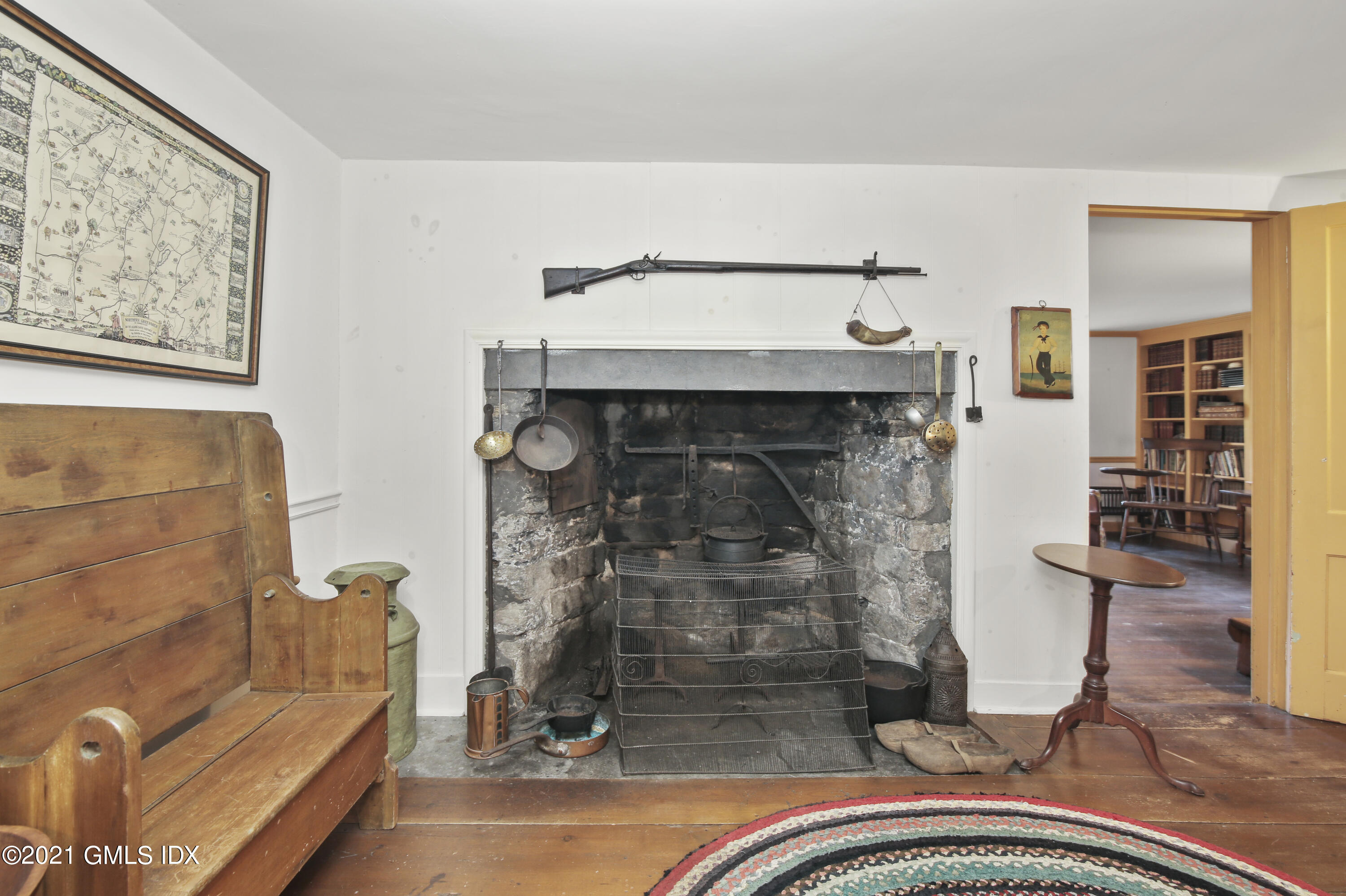 117 Dingletown Road Greenwich, CT 06830 - Photo 11 of 25 a living room with furniture and a fireplace