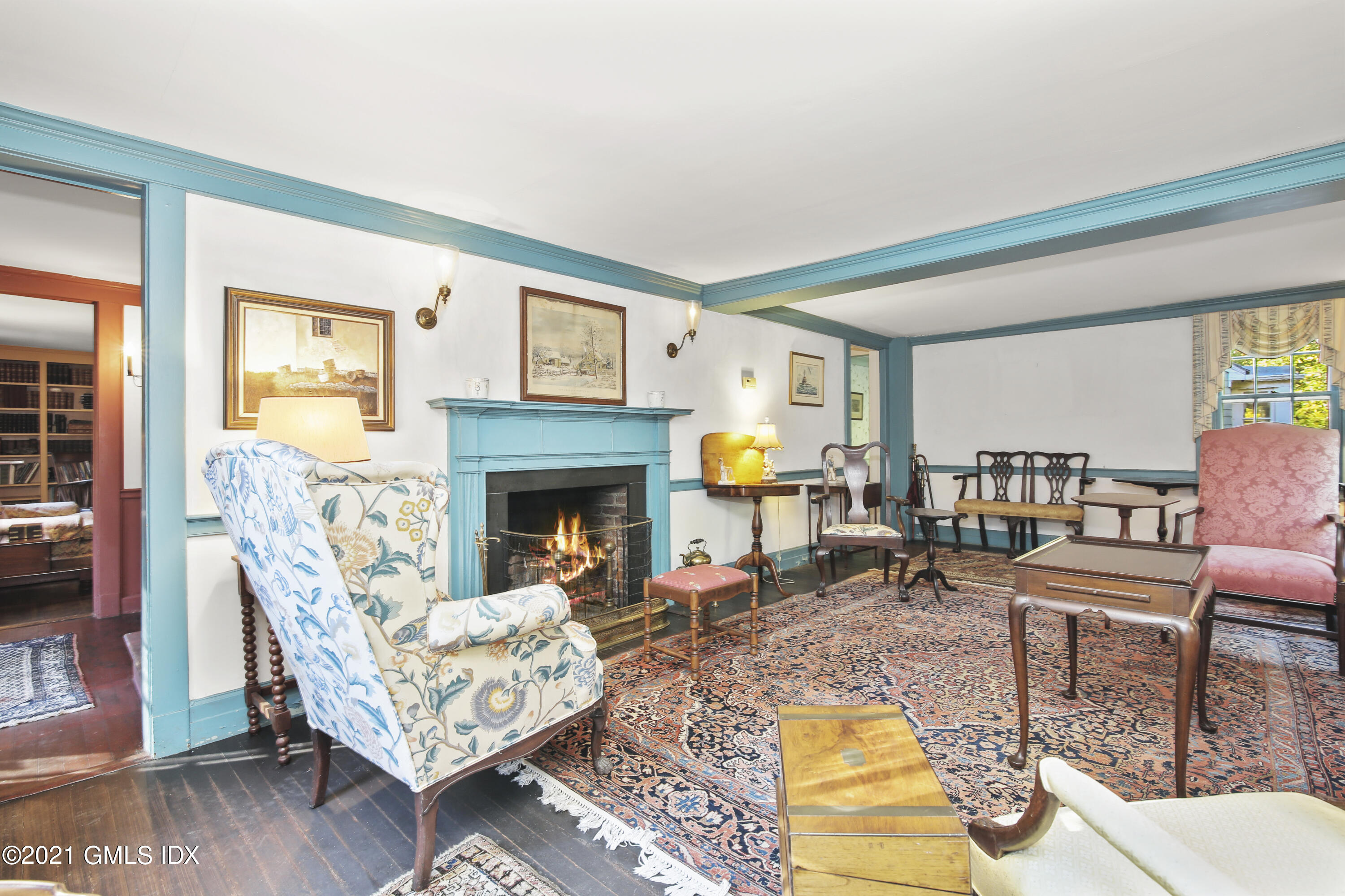 117 Dingletown Road Greenwich, CT 06830 - Photo 5 of 25 a living room with furniture and a fireplace